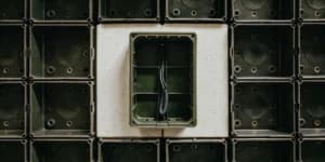 A selection of different electrical box types for a homeowner's wiring project.