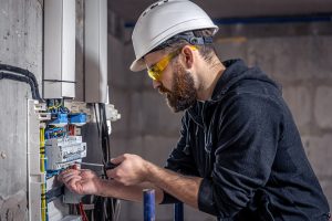 electrician making emergency repairs
