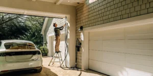 Electrician installing a Level 2 EV charger in a Florida garage